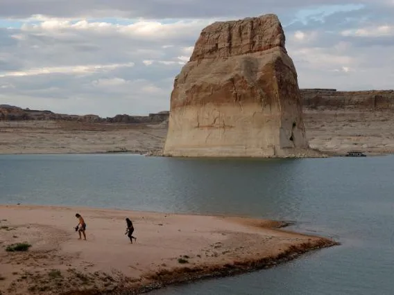 picture of large rock in water