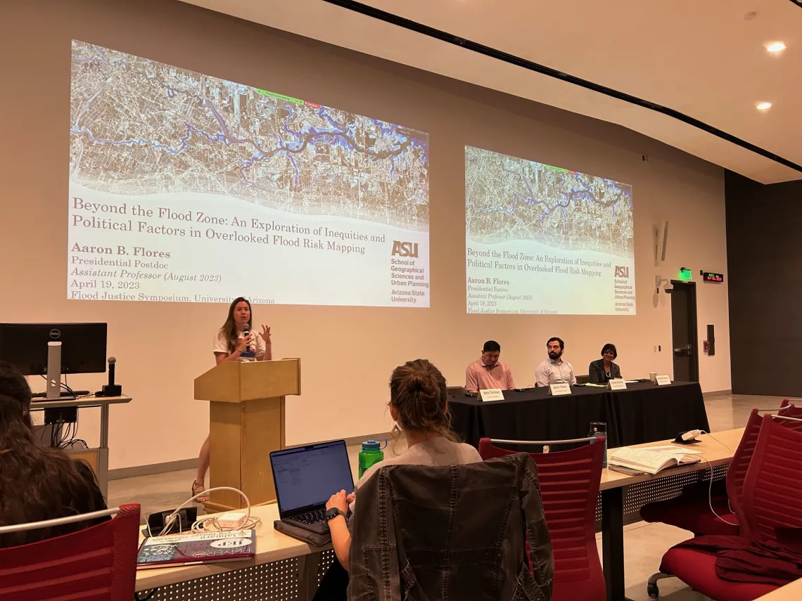 Beth Tellman, UArizona, introduces speaker Aaron Flores, ASU, on the data-empowered flood justice panel at the Flood Justice Symposium 2023. 